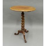 A Victorian mahogany barley twist tripod table. 47 cm diameter.