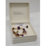 A 9 ct gold suite of jewellery, comprising of an amethyst bracelet, a pair of earrings and a ring.