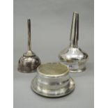 Two Edwardian silver plated wine funnels. Largest 15.5 cm high.