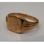 A gentleman's 9 ct gold signet ring. Ring size R (4.2 grammes).