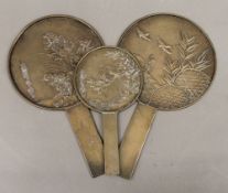 Three Japanese bronze mirrors. The smallest 16.5 cm high.