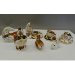 Seven unboxed Royal Crown Derby paperweights (all with stoppers), including Donkey,