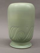 A Susie Cooper green ground vase. 23 cm high.