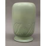 A Susie Cooper green ground vase. 23 cm high.