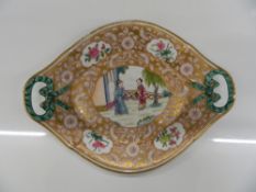 A 19th century Chinese famille rose twin handled dish. 29 cm wide.