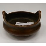 A small bronze censer. 8.5 cm wide.