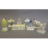 A collection of Coalport cottages, including: Tyrolean Castle, The Provision Shop,