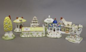 A collection of Coalport cottages, including: Tyrolean Castle, The Provision Shop,
