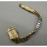 A Smiths 9 ct gold cased ladies wristwatch, inscribed to reverse Thos.