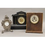 A Victorian black slate mantle clock,