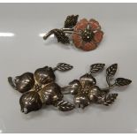 Two silver brooches. Largest 8.5 cm wide (24.