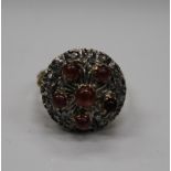 An antique 18 ct gold ruby and diamond chip ring. Ring size L (6.