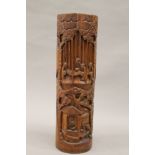 A Chinese carved bamboo brush pot. 38.5 cm high.