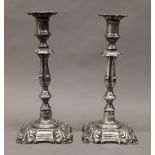 A pair of Elkington plated candlesticks. 30 cm high.