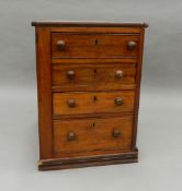 A Victorian mahogany bank of drawers. 63 cm high.