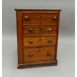 A Victorian mahogany bank of drawers. 63 cm high.