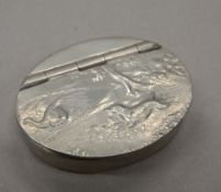 A James Dixon and Son snuff box embossed with dog chasing a bird in a country scene. 5.5 wide.