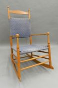 A 20th century Shaker rocking chair. 60 cm wide.