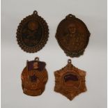 Four Chinese medals. Largest 5.5 cm high.