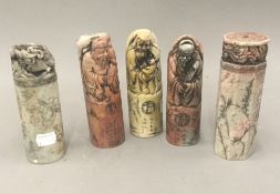 Five Chinese soapstone seals. The largest 14.5 cm high.