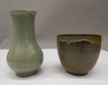 A Chinese celadon vase and another. The former 16.5 cm high.