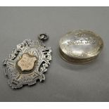 A silver fob inscribed HCC BATTING 1909 and small silver first tooth box.