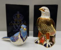 Two boxed Royal Crown Derby paperweights of birds (both with stoppers). The tallest 16.5 cm.