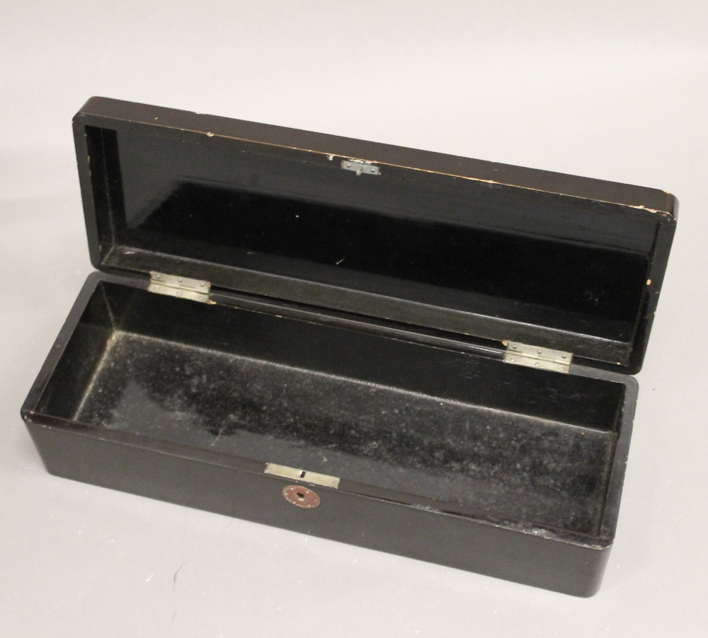 An early 20th century Japanese lacquered glove box. 30 cm wide. - Image 2 of 2