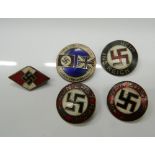 Five Nazi type badges. Largest 2.5 cm diameter.