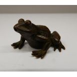A Japanese bronze model of a frog. 2.25 cm high; 4 cm long.