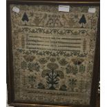 A 19th century sampler worked with a verse, trees and butterflies, etc.