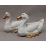 A pair of Chinese porcelain geese. 32 cm long.
