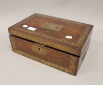 A 19th century brass inlaid rosewood writing slope. 35.5 cm wide.