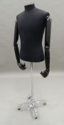 A dress makers mannequin, on stand. 140 cm high.