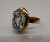 An unmarked gold aquamarine ring. Ring size J (3.2 grammes total weight).