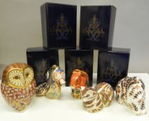 Five boxed Royal Crown Derby paperweights (all with stoppers), including Coral Seahorse, an owl,