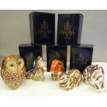 Five boxed Royal Crown Derby paperweights (all with stoppers), including Coral Seahorse, an owl,