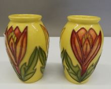 A pair of small yellow ground Moorcroft vases. 10 cm high.