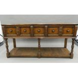 A 17th/18th century style oak dresser base. 167 cm wide.