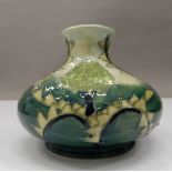 A small modern Moorcroft vase. 10 cm high.