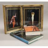 Two framed photographs of Rudolf Nureyev; together with two books,