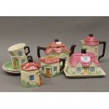 A Cottage Ware breakfast set. The teapot 19 cm wide.