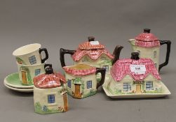 A Cottage Ware breakfast set. The teapot 19 cm wide.