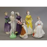 A small collection of various Royal Doulton and Royal Worcester figurines, including Morning Walk,