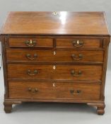 A Georgian mahogany bureau. 107 cm wide.