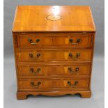 A modern yew wood veneered bureau. 75 cm wide, 94 cm high, 42 cm deep.