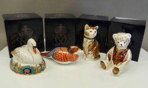 Four boxed Royal Crown Derby paperweights (all with stoppers), including Marmaduke, a swan,