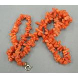 A coral necklace. 42 cm long.