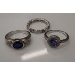Three silver stone set rings (8.