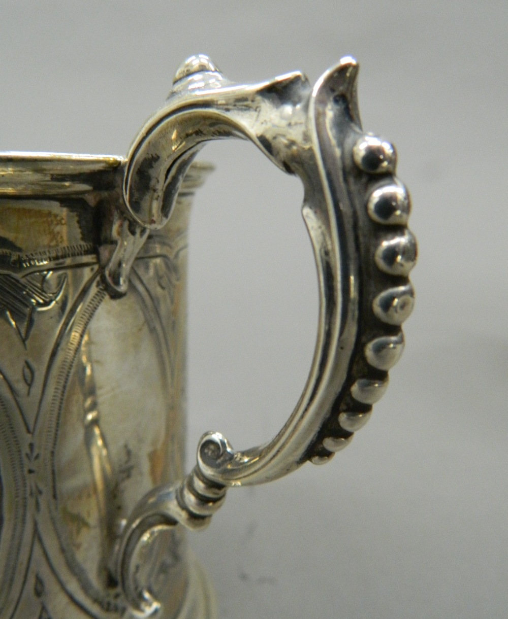 A silver Christening mug. 8.5 cm high (4. - Image 2 of 3